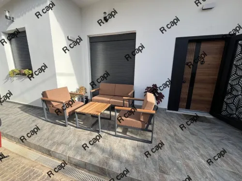 Salon extérieur jardin piscine