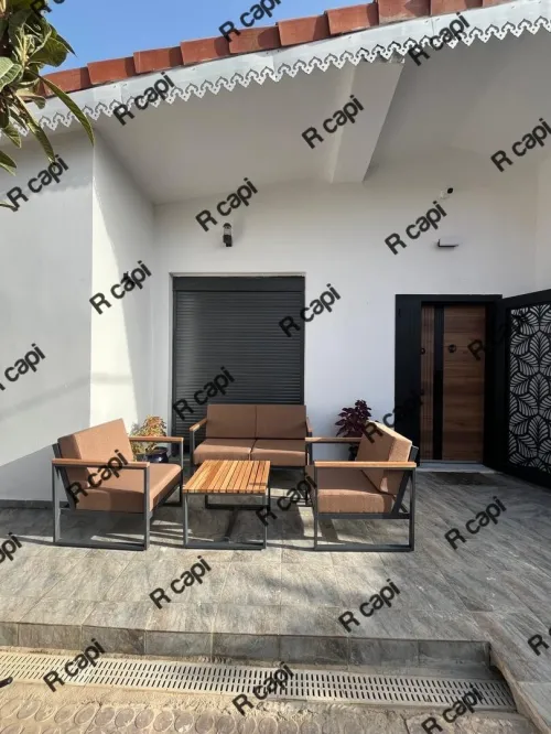 Salon extérieur jardin piscine