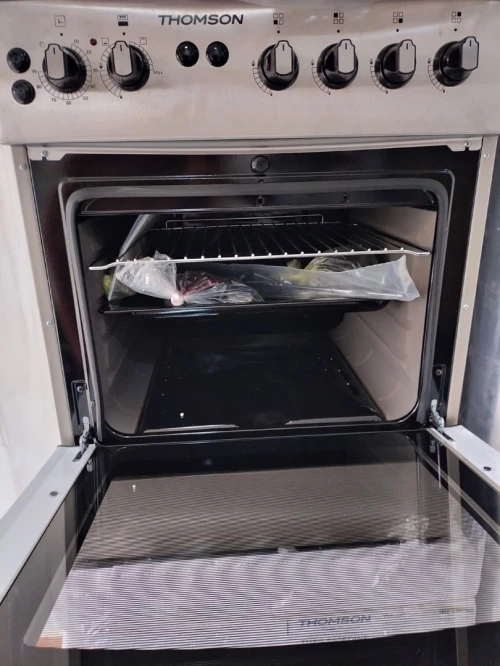 Gaziniere THOMSON 4 feux inox four ventilé catalyseur 