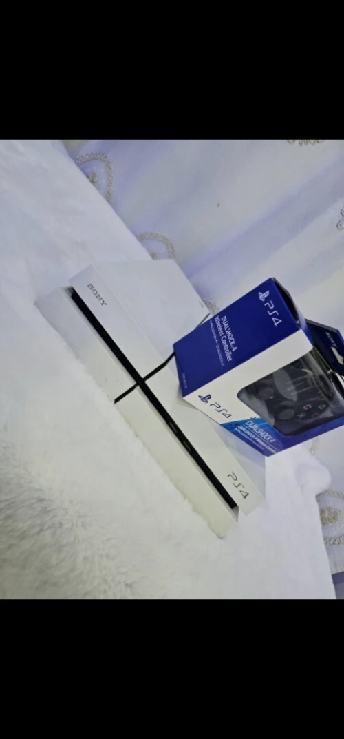 ps4 modéle 1216A version 13.50 avec mannete 500gb  (معمر بالالعاب) avec ticket de garantie