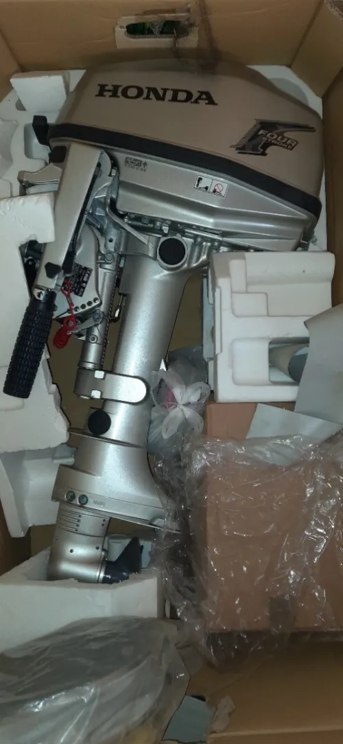 Bateau gonflable + moteur Honda