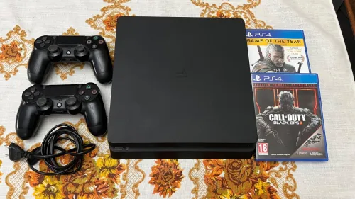 PS4 Slim ÉTAT NEUF JAMAIS OUVERTE IMPORTÉE FRANCE + PACK JEUX