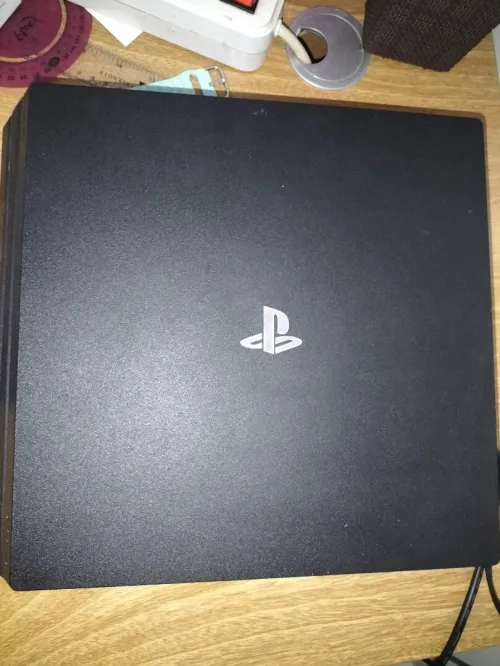 PS4 pro + GTA 5+ fc24+2manaite