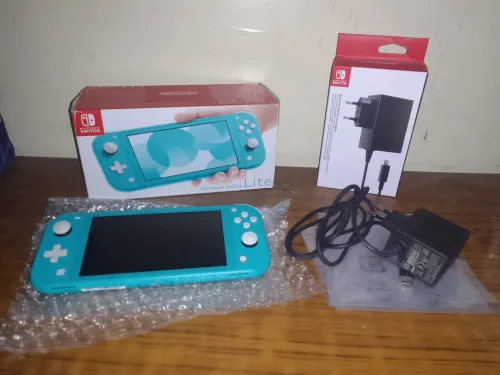 Nintendo switch lite flashée avec sa boit