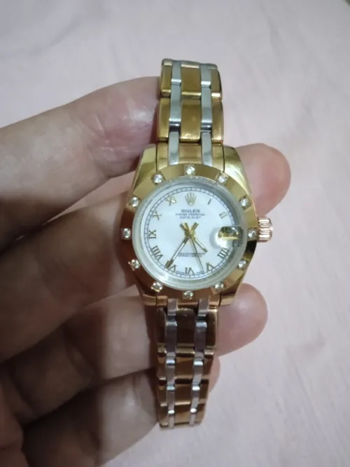 Montre femme, mq Rolex, mécanique 