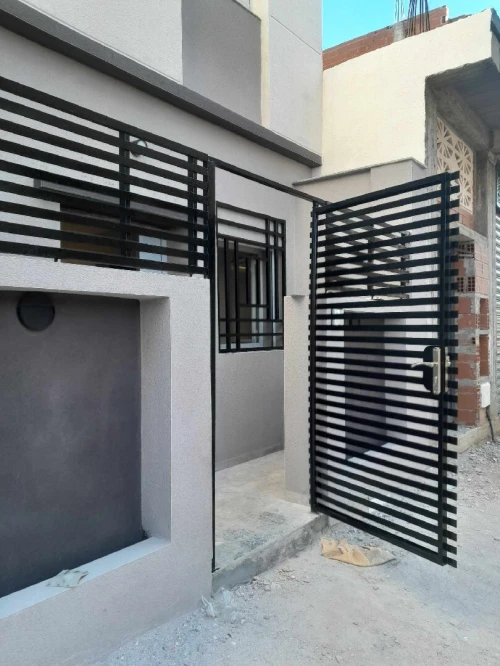 Facade en monocouch gratté et mouchter écrasé.......