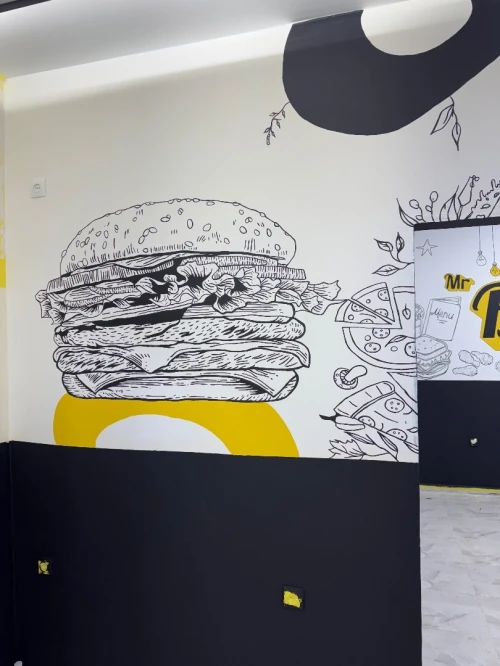 Dessinateur mural رسام جداريات