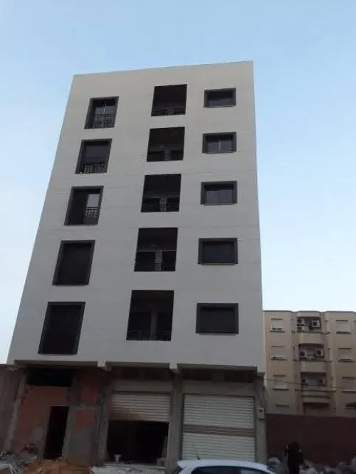 Traitement façade monocouche