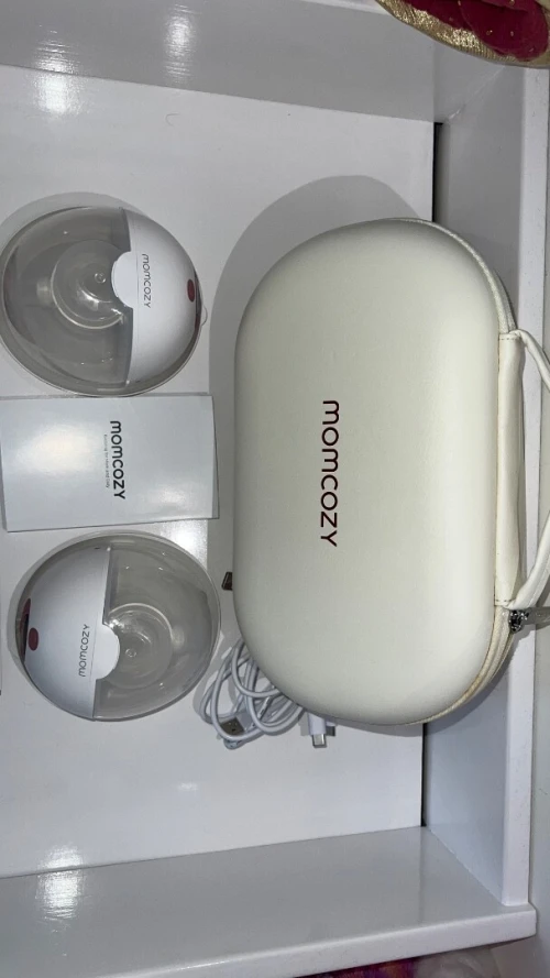 Momcozy tire lait