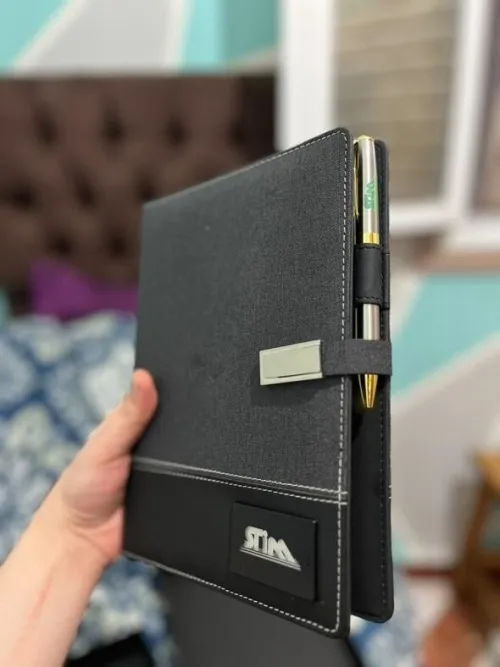 Pack carné doté d'une battre rchargeable avec tout types de câble,porte carte de la société satim 