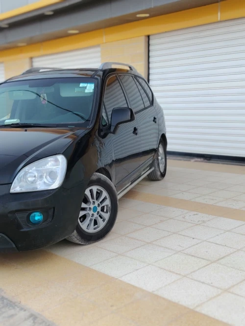 Kia Carens 2012 7 place