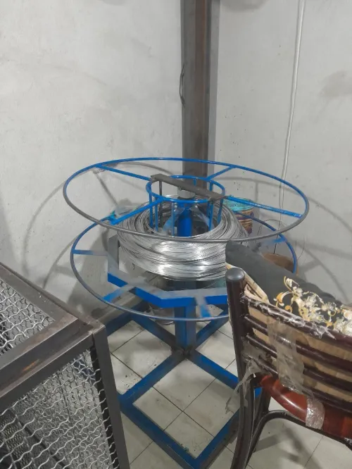 MACHINE RESSORT PINCE A LINGE مساك