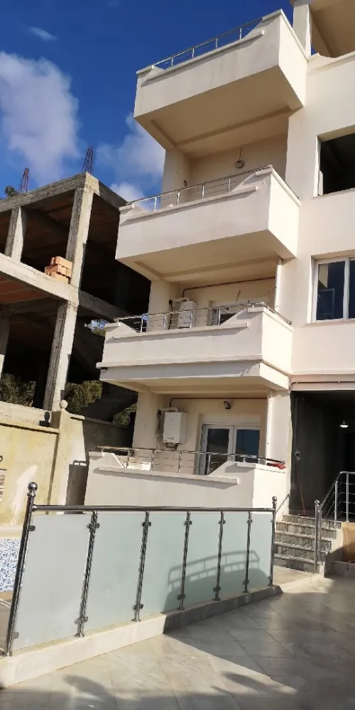 Rampe d'escalier inox et cabine douche