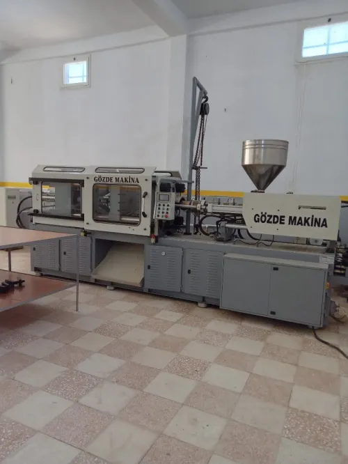 Machine injection plastique 200t 