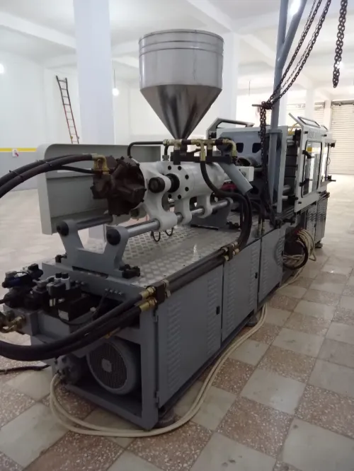 Machine injection plastique 200t 