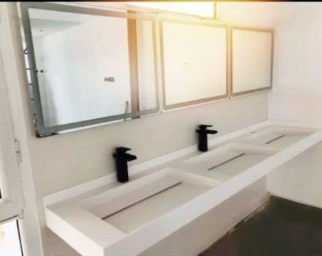 Lavabo collectif sur mesure en CORIAN
