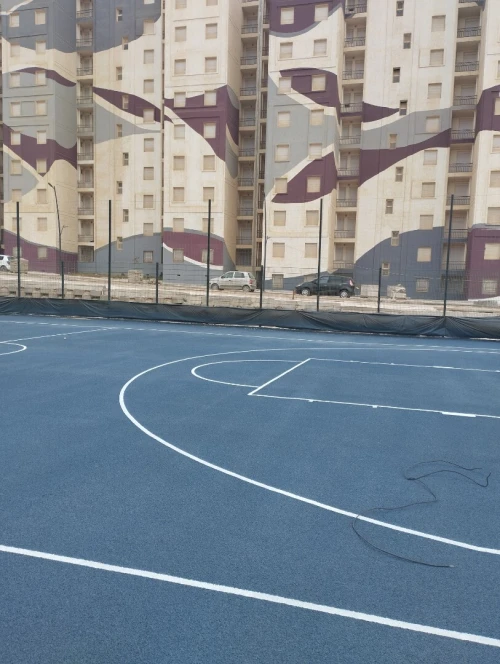 Revêtement terrain de sport et salle en sols sportifs gomme synthétique acrylique epdm tapis 