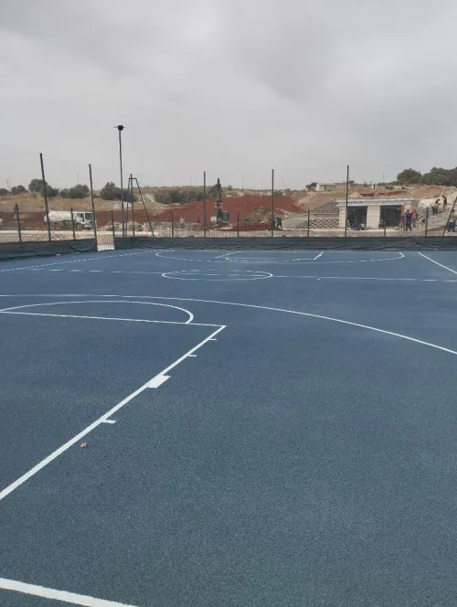 Revêtement terrain de sport et salle en sols sportifs gomme synthétique acrylique epdm tapis 