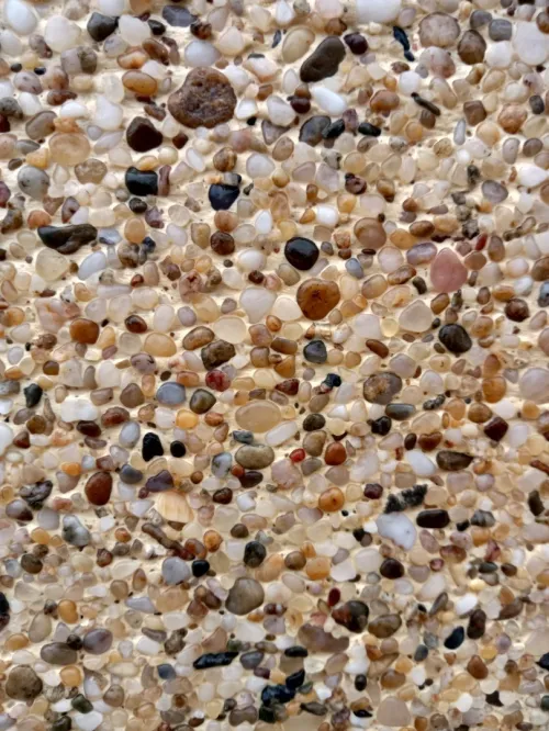 Revêtement et traitement de façade en mignonette et Grain de marbre 