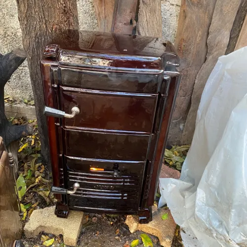 poele a bois en fonte emaille مدفأة حطب فونت ماي وداخل حجر ناري
