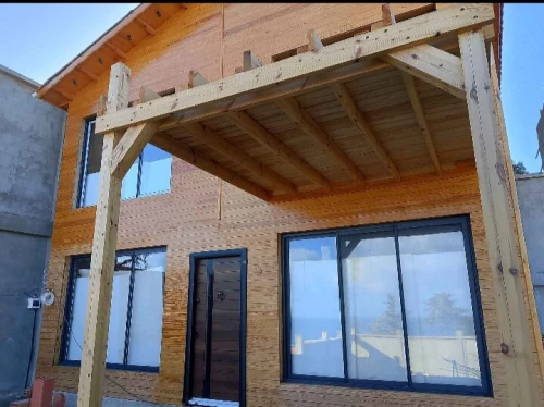 Construction des. Chalet bungalow en bois 