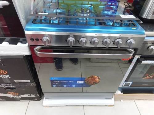 super promo cuisinière midea 5 feux-wok tabouna  inox 80cm ventilé 