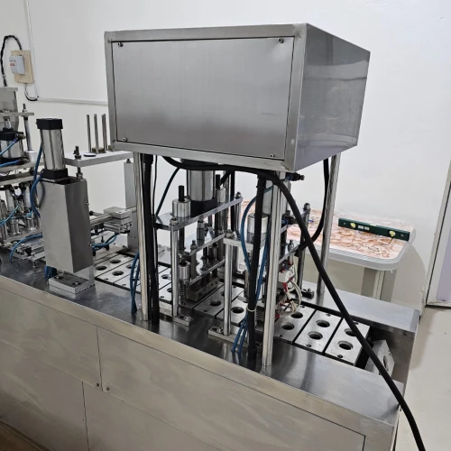 Machine de conditionnement de café en capsule