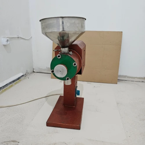 Machine de conditionnement de café en capsule