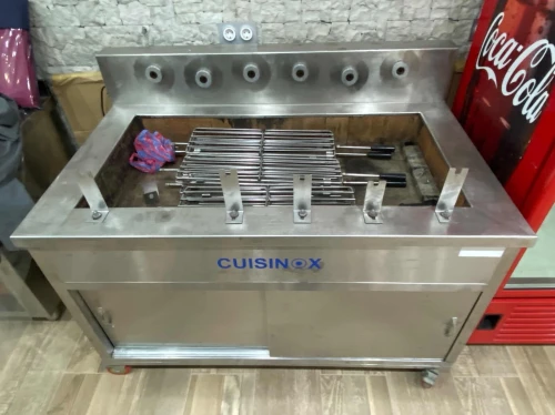 Rôtissoire à la braise, 6 bras, inox 100%, état neuf.