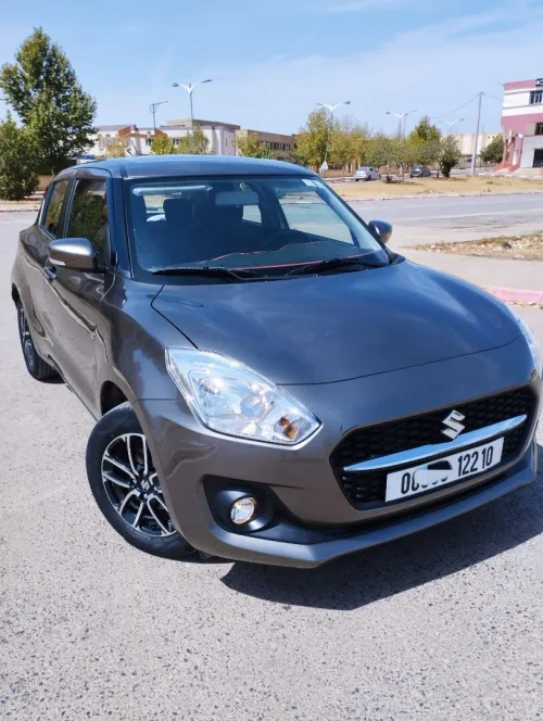 Suzuki SWIFT importer de Dubaï 2022 GLX LA TT MAJMOLA 1ER MAIN BOIT AUTO FAIBLE KILOMÉTRAGE