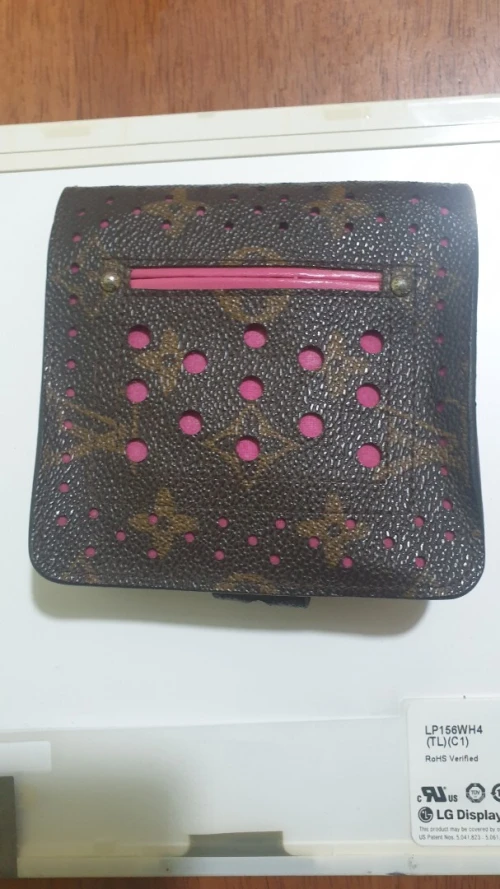 Portefeuille Louis Vuitton authentique  édition limitée perforé