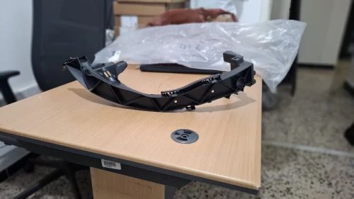 Porte phare droite bmw e87
