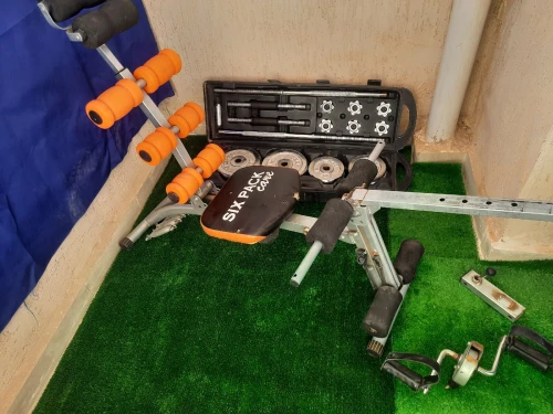 Valise de 50kg + machine des abdominaux 
