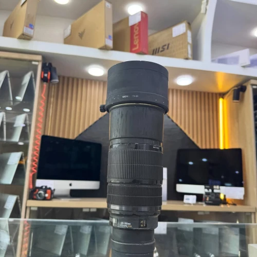 Objectif SIGMA 120-300mm F2.8 en bon état avec deux bouchons