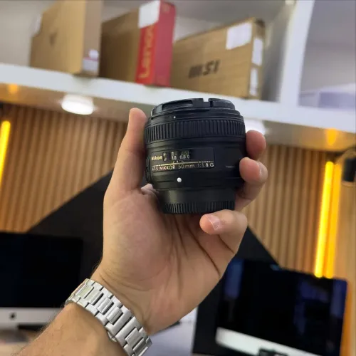 Objectif NIKON 50mm 1.8G en excellent état.