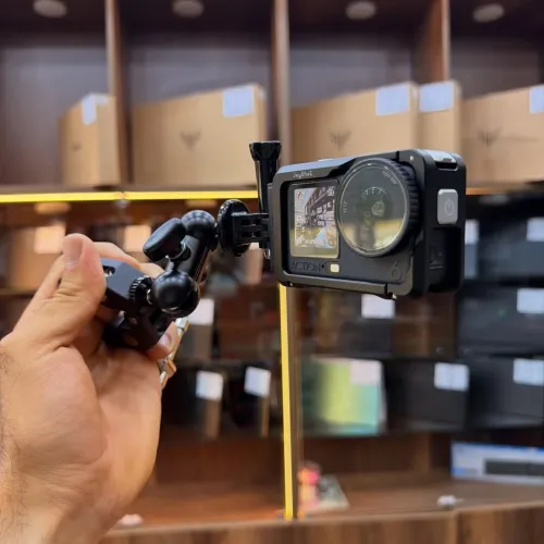 Dji osmo action 6 en excellent etat comme neuf avec sacouche plus cage metalique et support