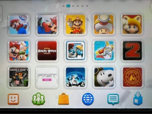 Nintendo Wii U en très bon etat avec 15 jeux