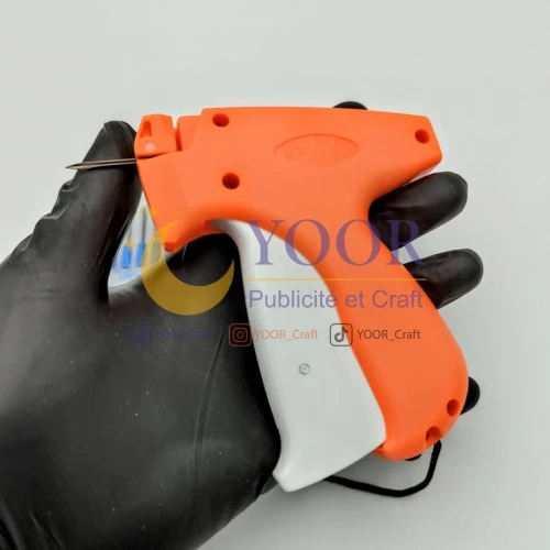 Pistolet etiquetage orange أداة وسم الألبسة برتقالية