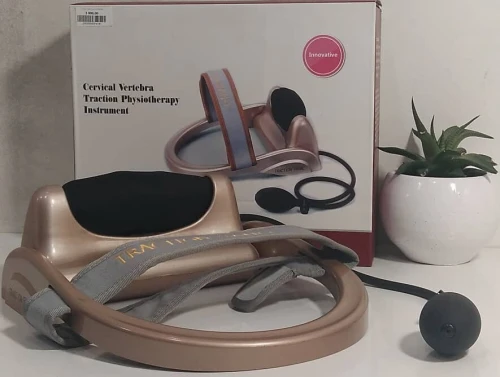 APPAREIL DE TRACTION CERVICALE PAR POMPE À AIR
