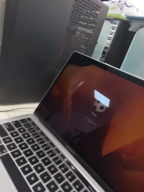 Macbook pro touchbar 2018 ramené des usa cycle de charge 40