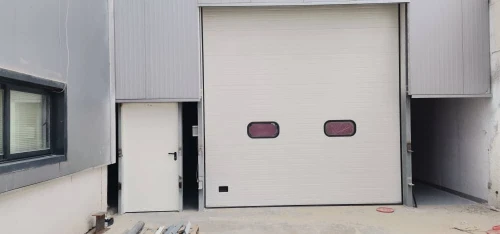 Porte Sectionnelle industrielle et résidentielle en panneau sandwich (أبواب  مقطعية صناعية منزلية)