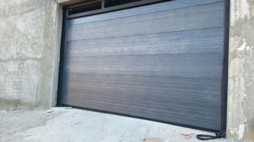 Porte Sectionnelle industrielle et résidentielle en panneau sandwich (أبواب  مقطعية صناعية منزلية)
