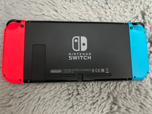 Nintendo switch v2 en ligne n9ya etat 10/10  Chargeur original b la boite Dock tv Support manette