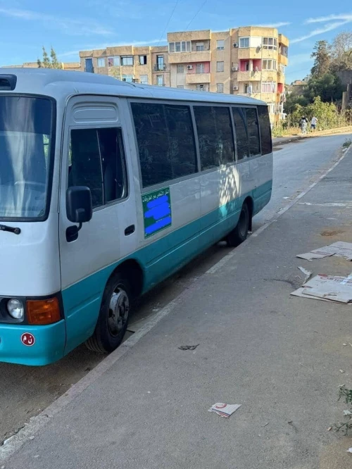 Location bus toyota qoaster 