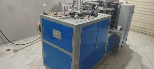 Machine gobles papies