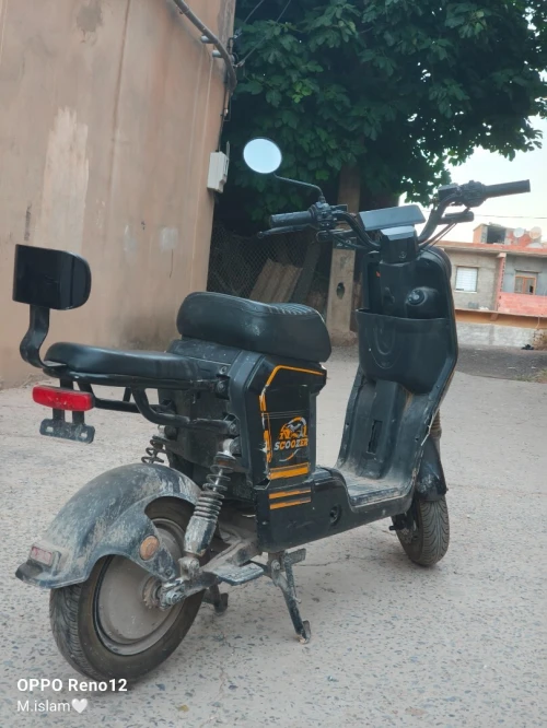 scoozer دراجة كهربائية 2025