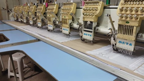 Machine broderie 6 tétes 10 tétes
