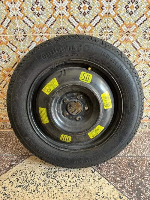 Roue de secours galette Continental 16 pouces Très bon état