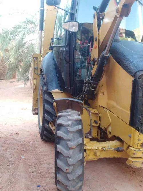 Caterpillar 428E Rétro chargeur Caterpillar 428E 2009