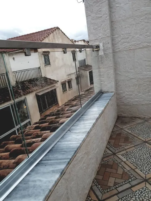 Garde corps et rampe d'escalier en verre et inox
